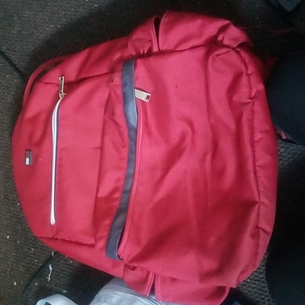 Red Tommy Hilfiger school backpack, perfect for middle school and high school!